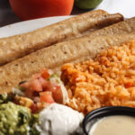 fried tortillas rice pico de gallo sauce guacamole sour cream