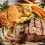 grilled fish steak rice onions grilled vegetables