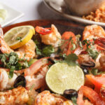 grilled shrimp 2 slices of lemons parsley rice pico de gallo